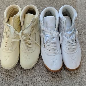 2 pairs of High top reeboks